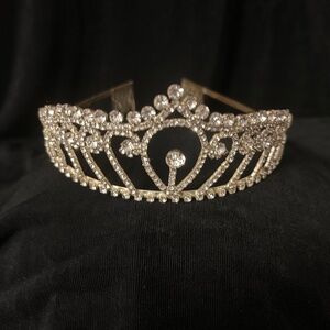 Rhinstone silver plated crown.
